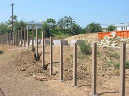 Установка столбов для забора своими руками